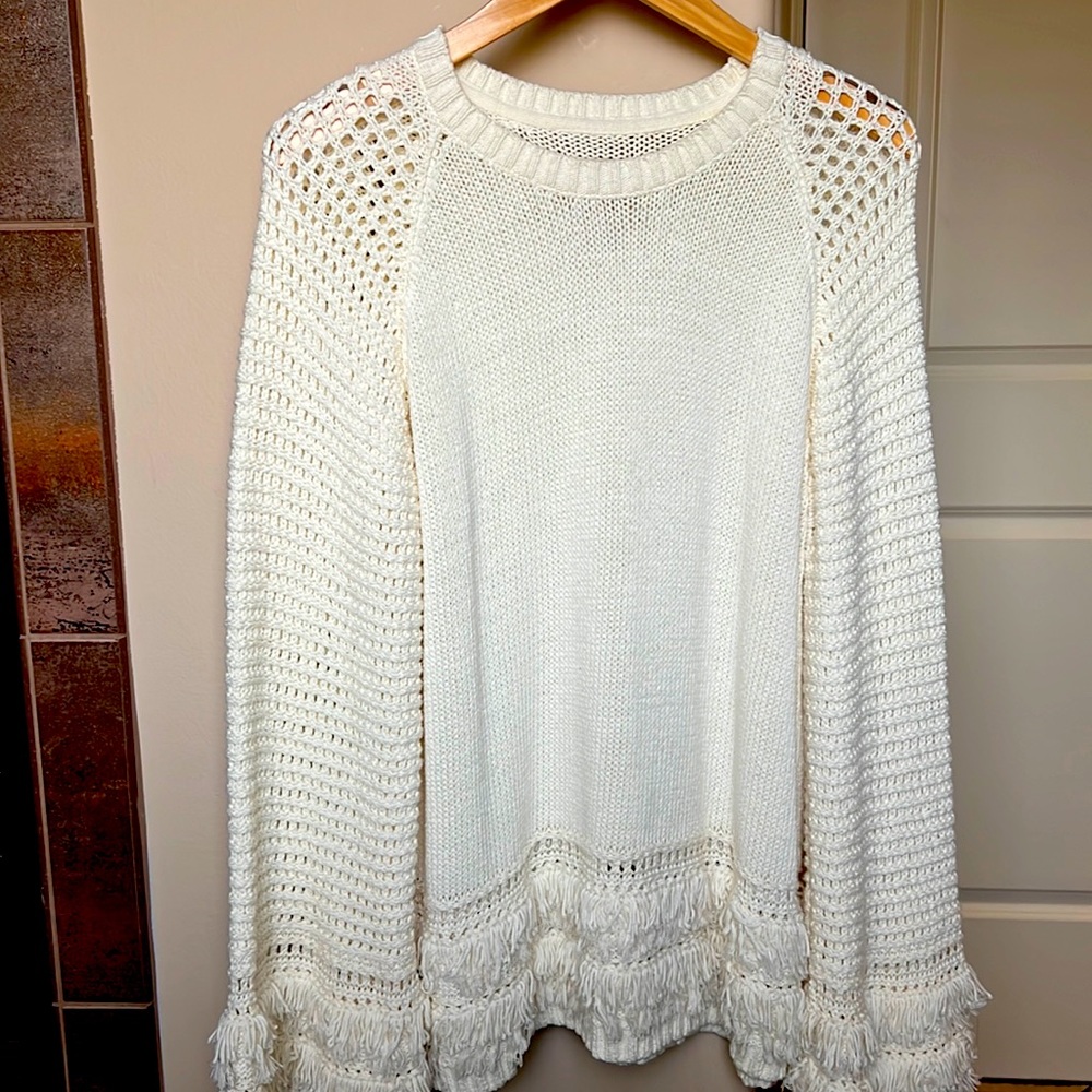CHASER cream sweater with fringe trim